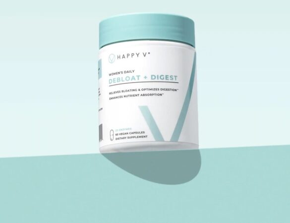 Happy V Debloat + Digest bottle on a pale aqua styled background