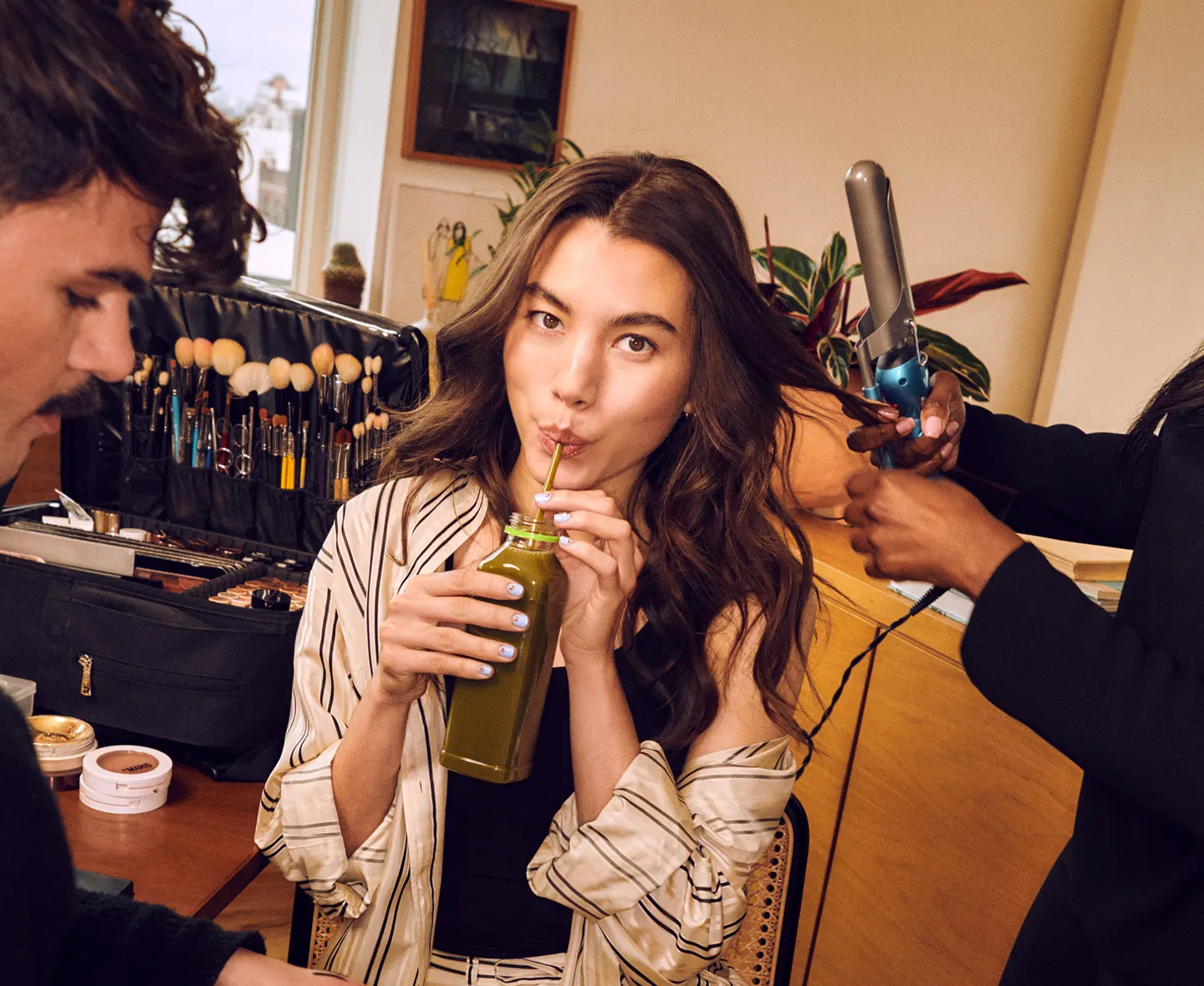 Client relaxing during an in-home beauty appointment
