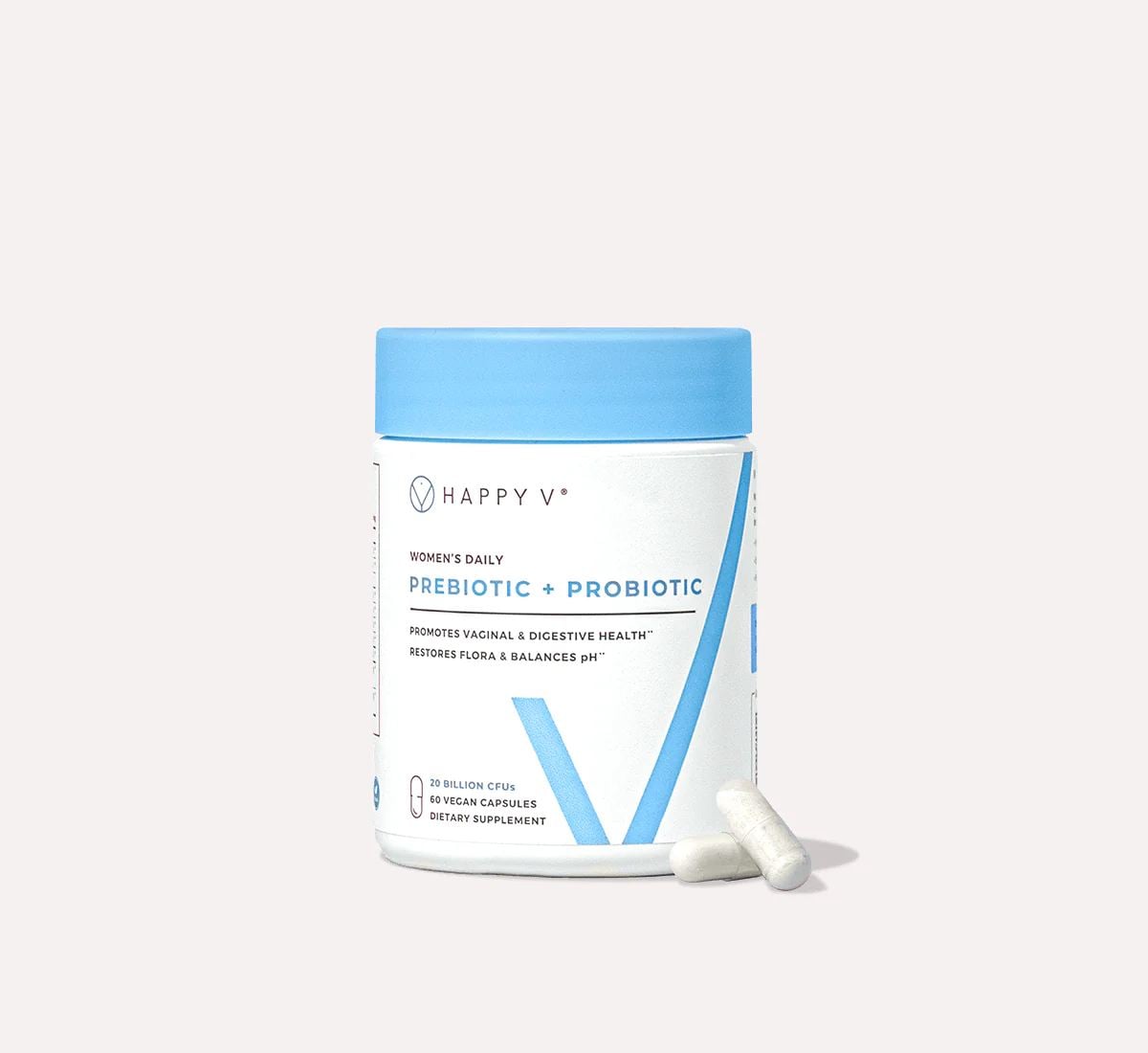 Happy V Prebiotic + Probiotic jar held in someone’s hands