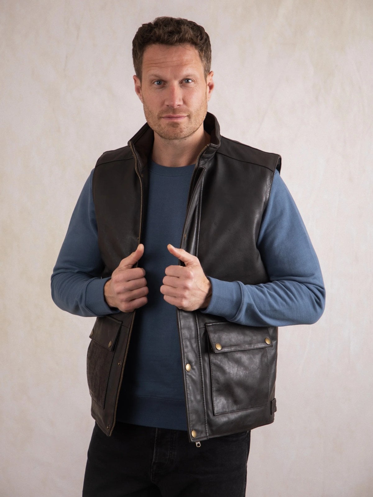 A brown Garrigill leather gilet with front pockets