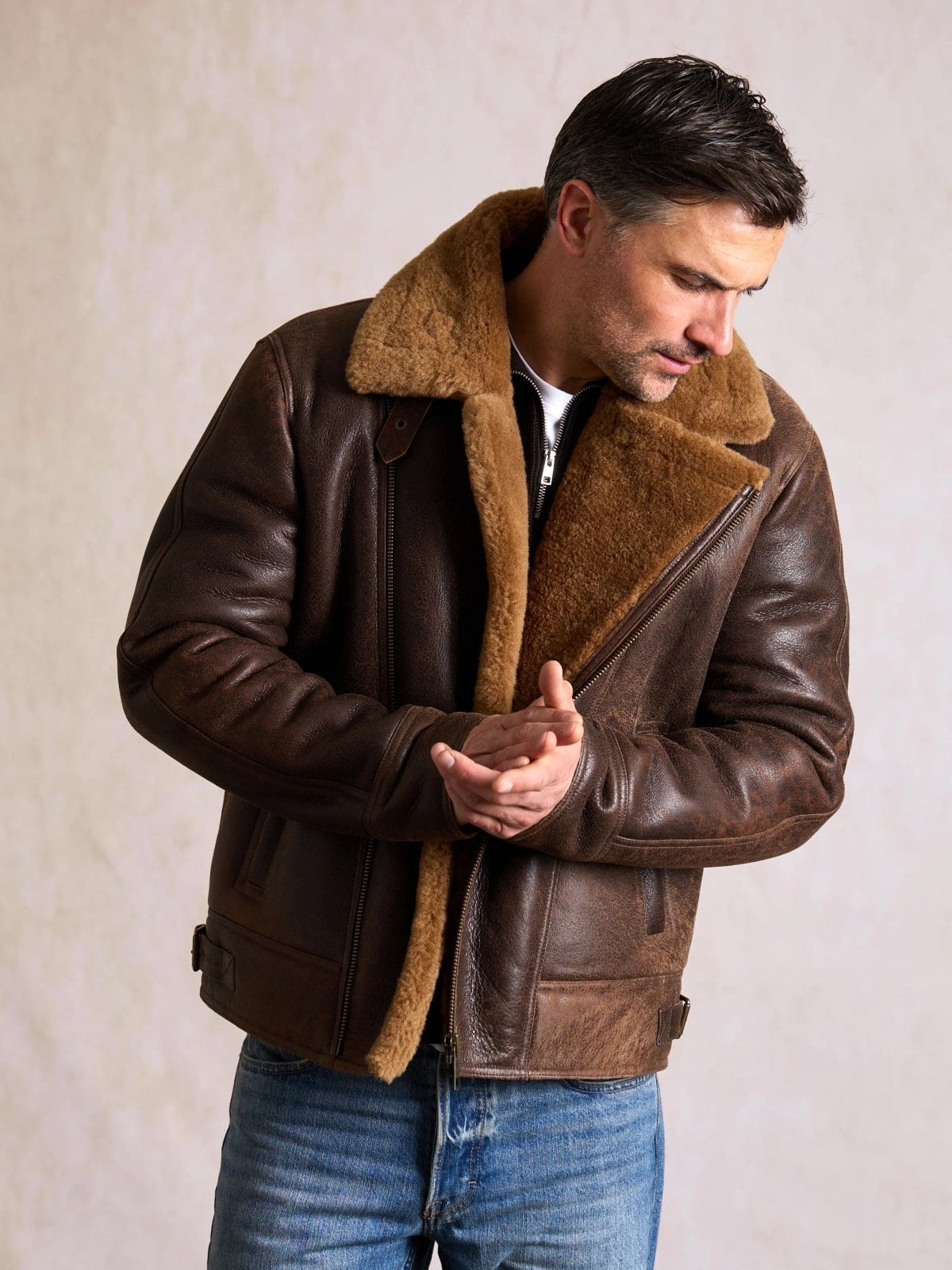 A brown Storth sheepskin aviator jacket with a broad collar
