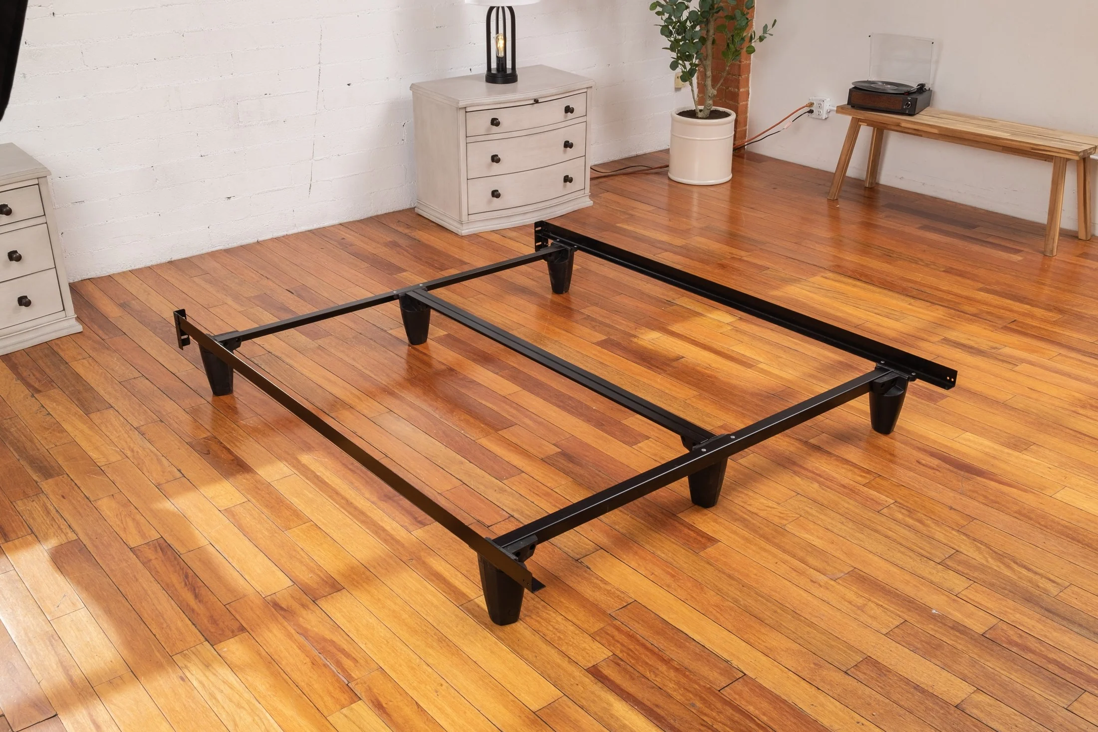 Bed frame shown in a bedroom setting