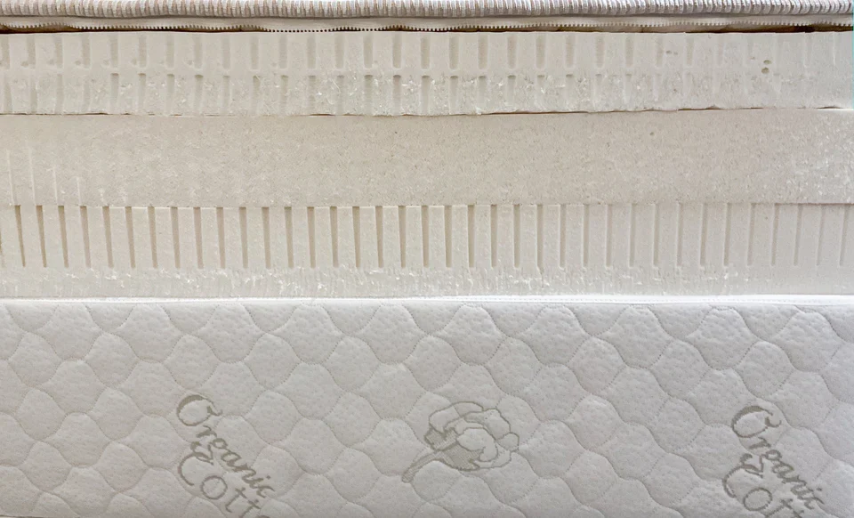 Layers of latex foam used in mattress construction