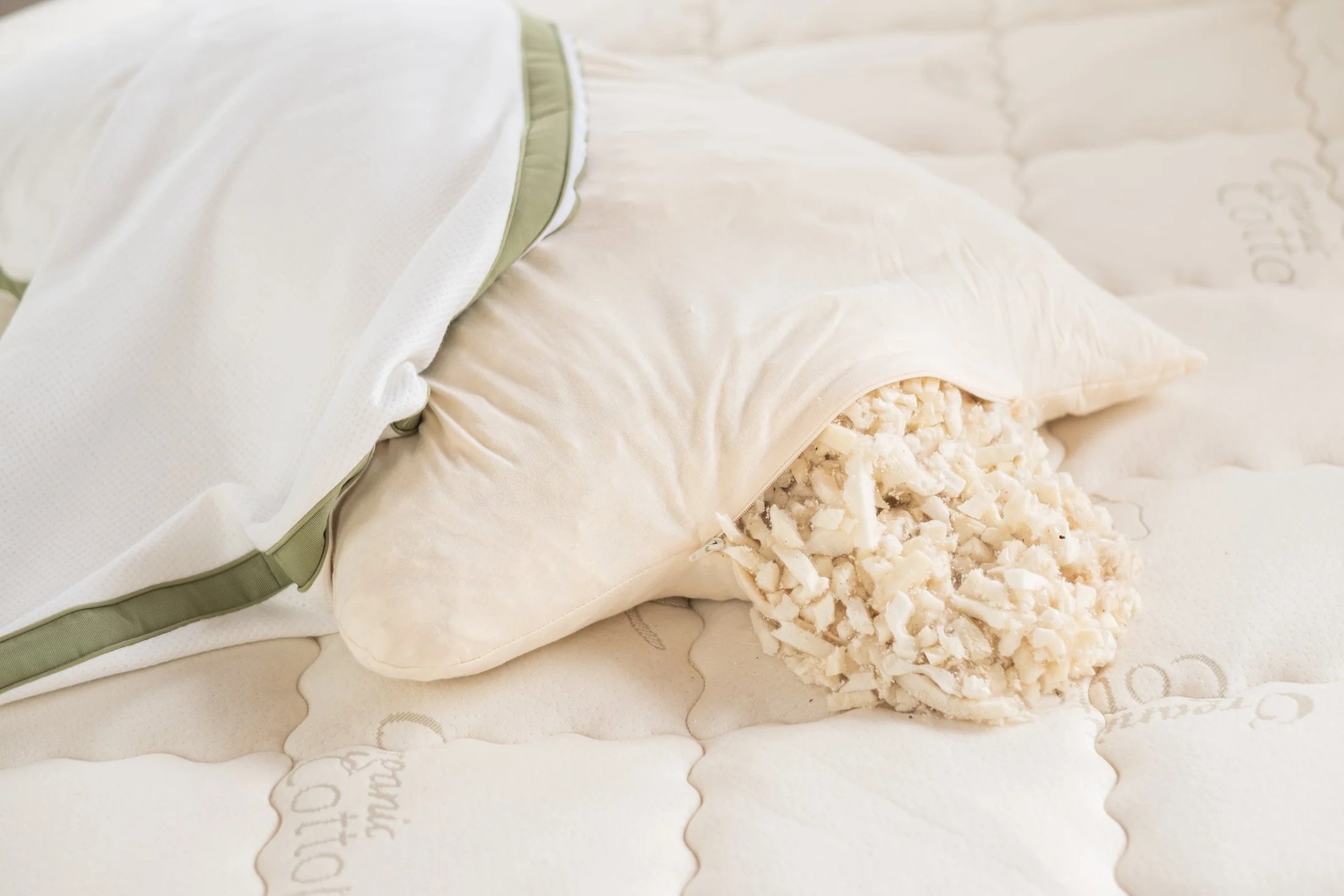 A made bed with a Latex Mattress Factory mattress