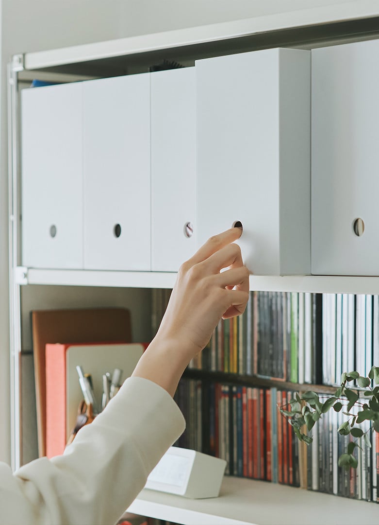 MUJI storage products arranged around a desk