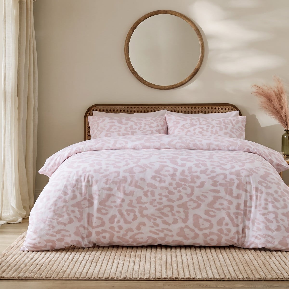 Natural leopard print brushed cotton duvet cover set arranged on a bed