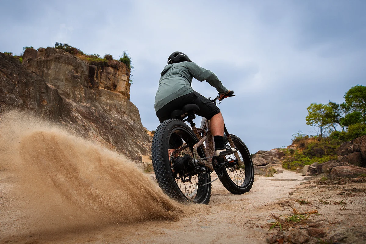 Electric bike shown on an off-road trail
