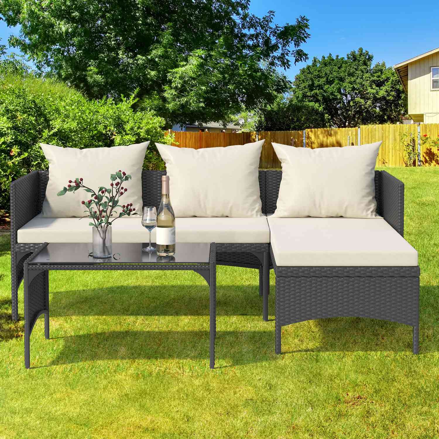 Compact rattan conversation set with two chairs and table