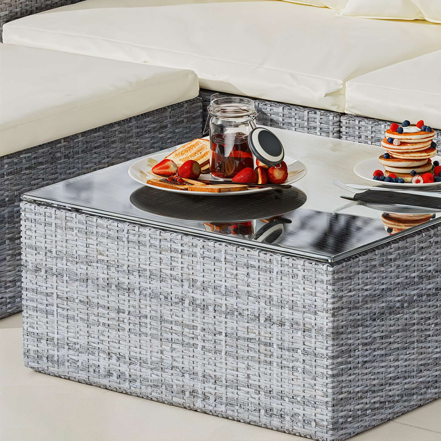 Modular rattan corner sofa with outdoor cushions