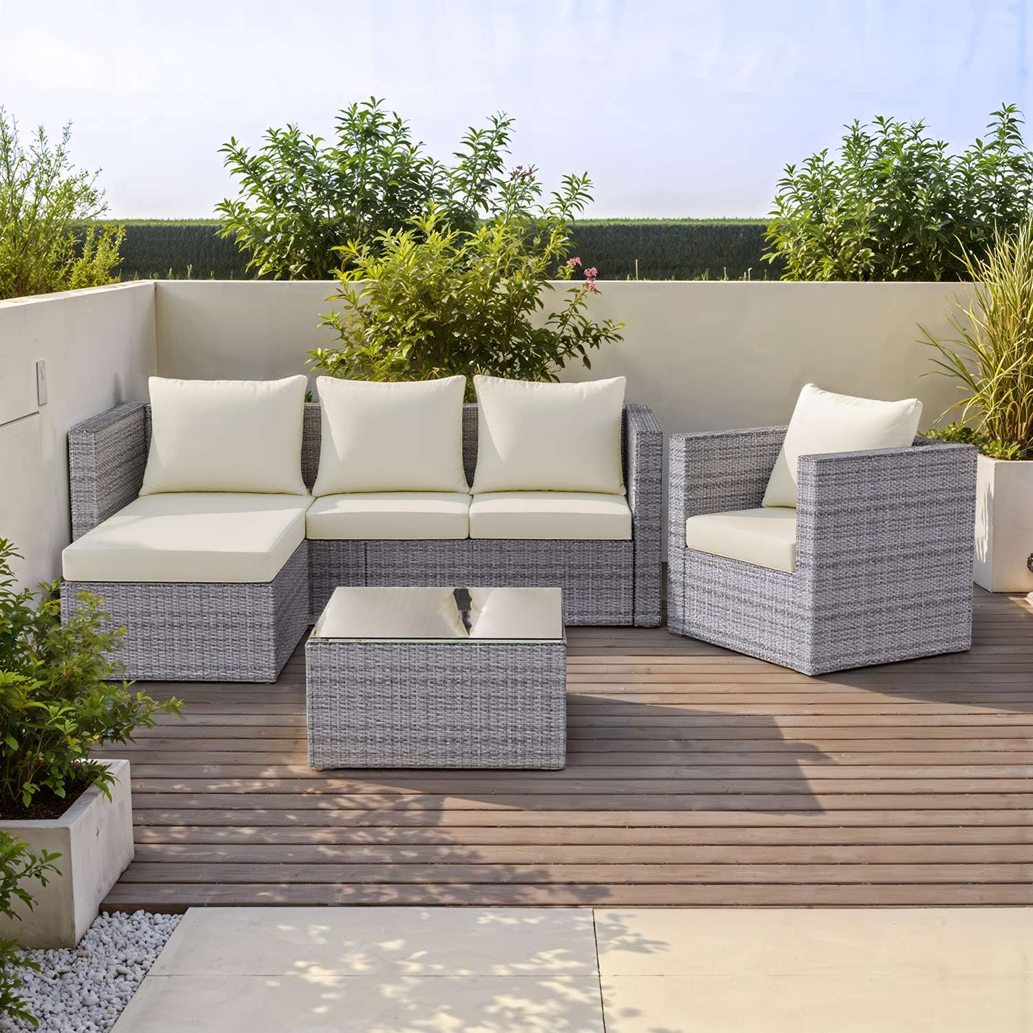 Modular rattan corner sofa set outdoors