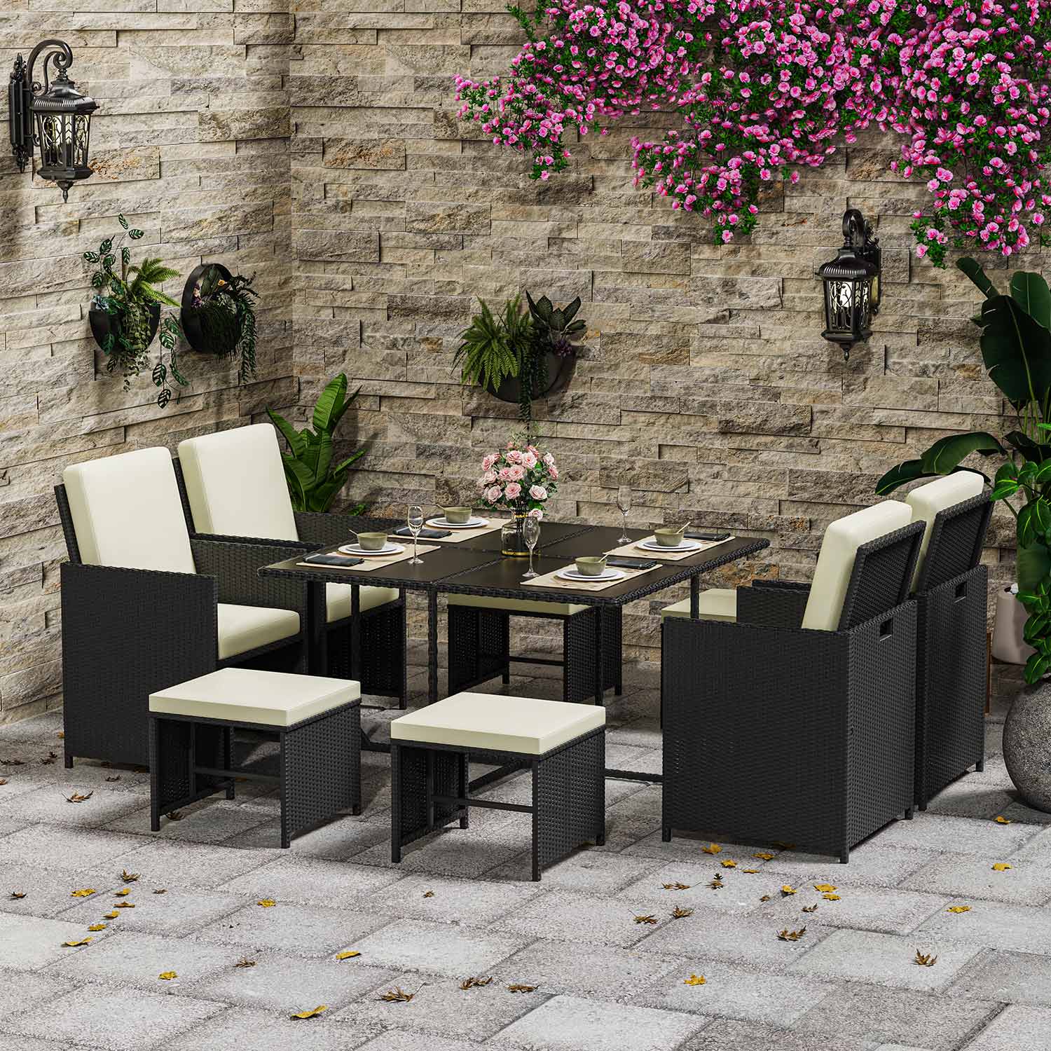 Rattan garden dining set with a table and chairs arranged for outdoor meals