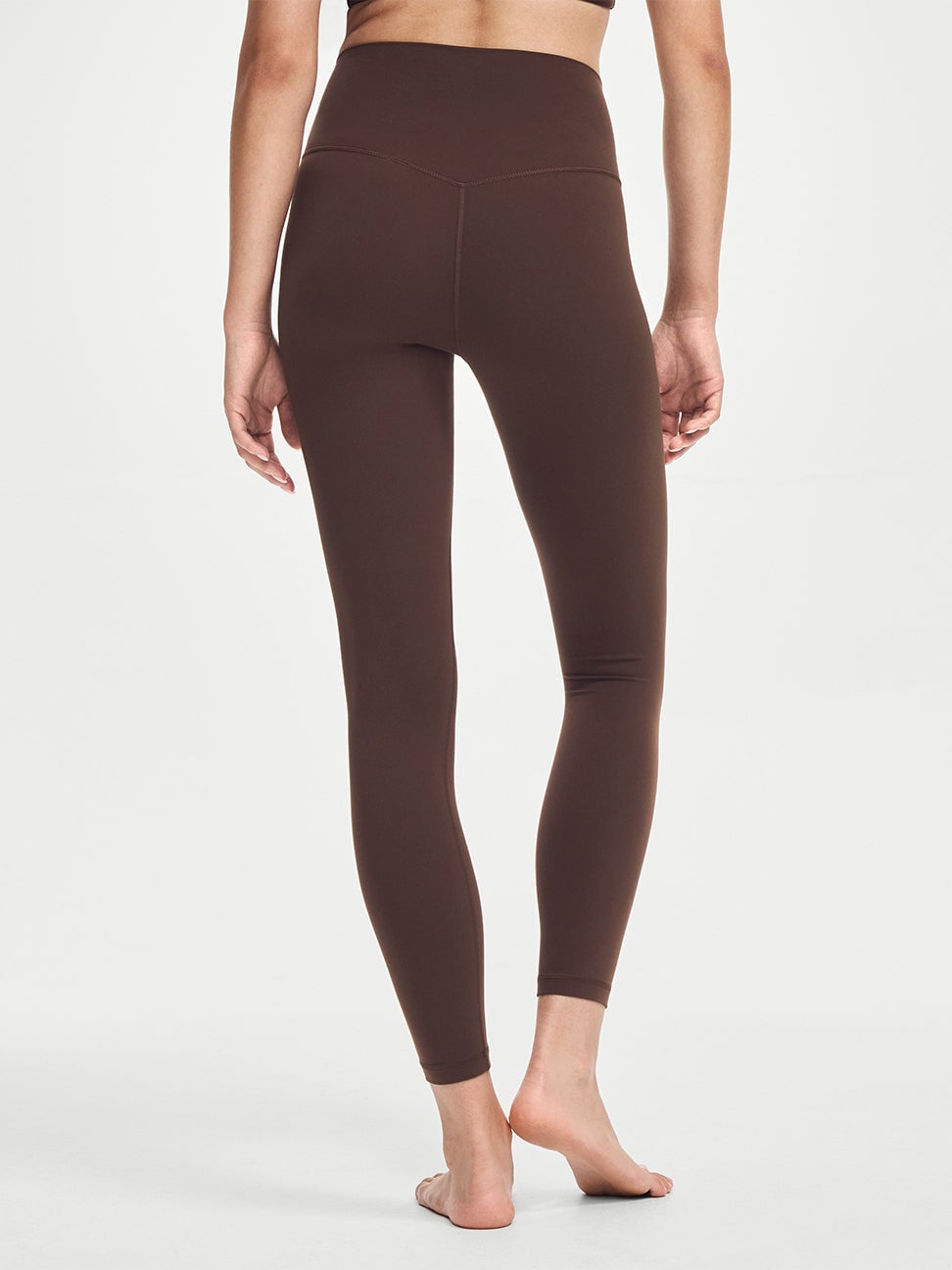 Model showing the back of brown LunaAiry High Waist Legging