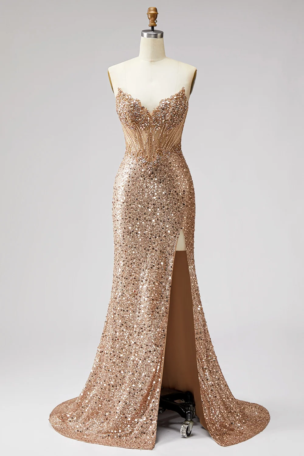 Golden strapless mermaid prom dress with rhinestone and sequin detail